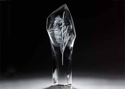 Pure clear glass sculpture with floating calligraphic carved